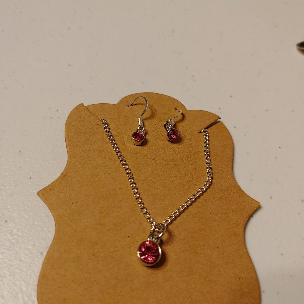 Rose pink colored birthstone set for October
